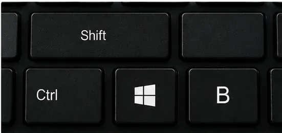 グラフィックドライバーをリセットするために使用される、Windows、Ctrl、Shift、およびBのショートカットキーを表すキーボードキーのクローズアップ画像。