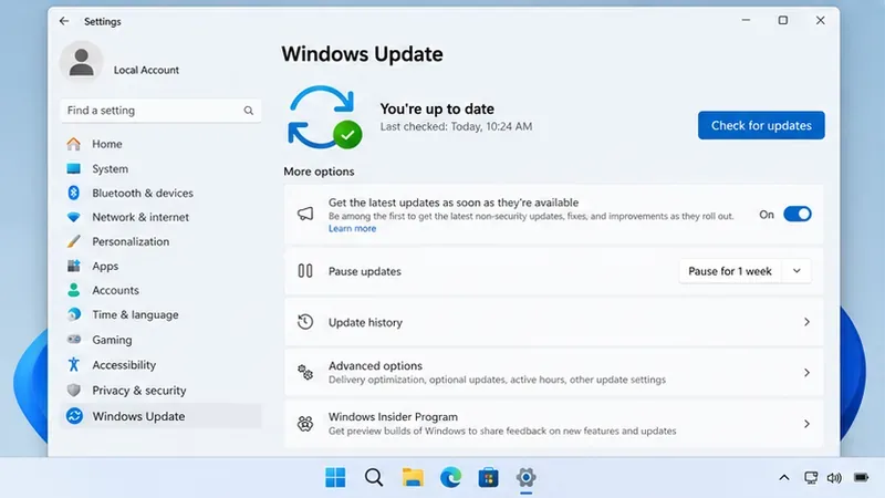 「更新プログラムの確認」ボタンと「最新の状態」を示すWindows Updateの設定画面。