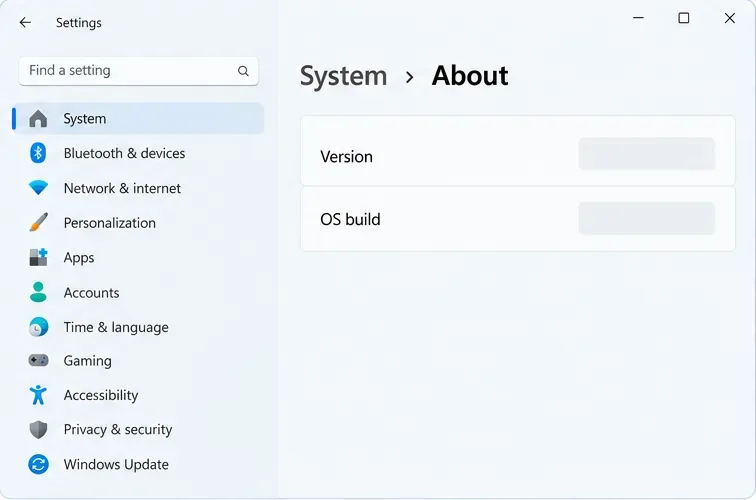 Windows 11 Settings System About page with blank value areas beside Version and OS build